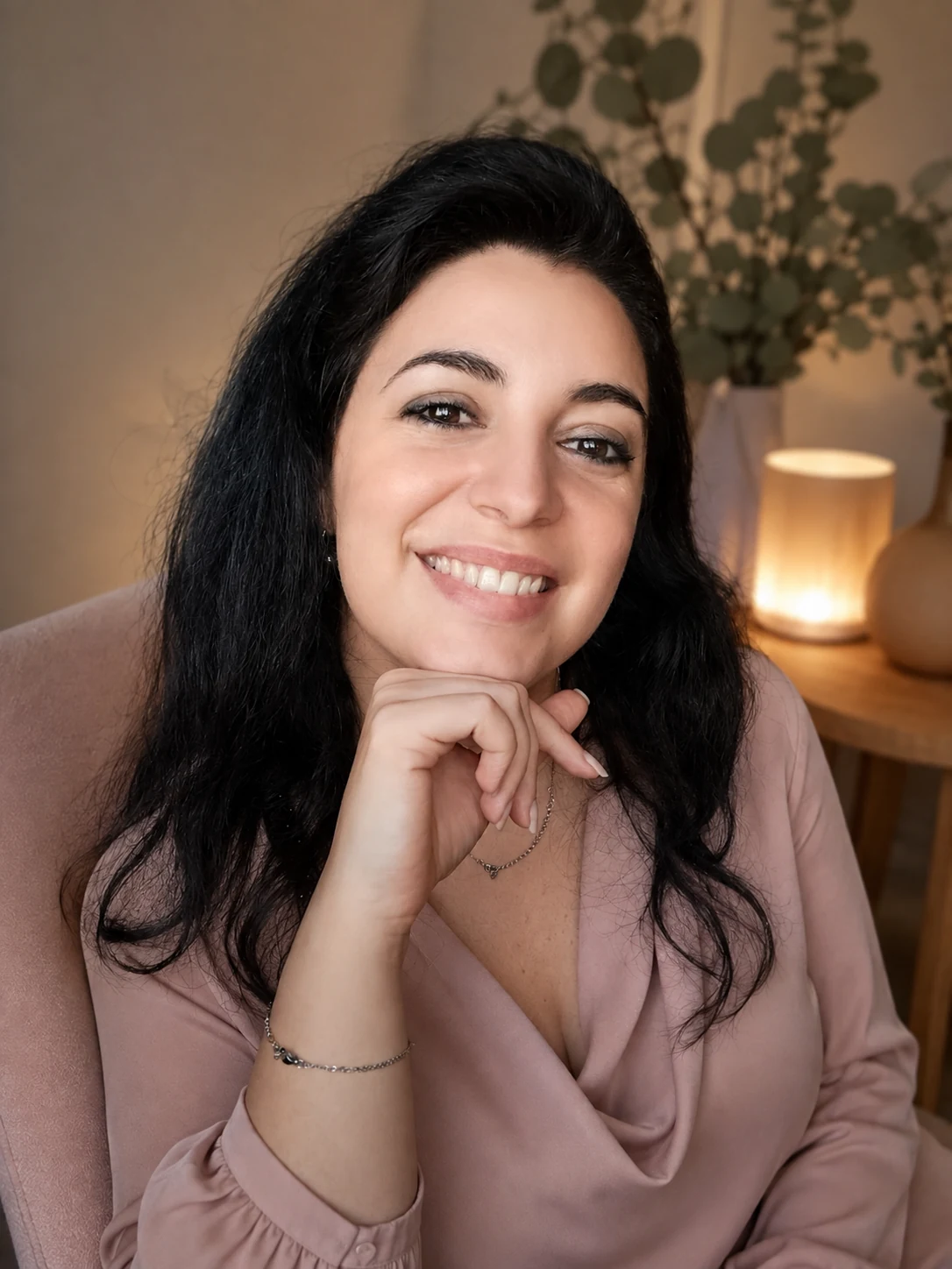 Stella Norsen, life coach and author, smiling warmly in a sunlit room